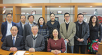 Prof. Fung Tung (middle at front row) poses for a group photo with delegates from Fudan University